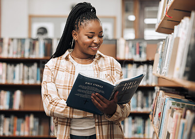 Buy stock photo Black woman, library and reading for knowledge, education and relax. Nigerian female, girl and student read book, bookstore and research for task, smile and enjoy free time with literature and study.