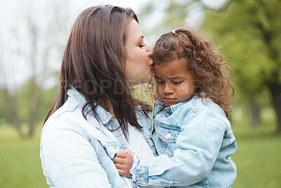 Buy stock photo Love, park and mother kiss child with upset, sad and unhappy expression on face for leaving playground. Family, support and mom kissing young girl for compassion, comfort and console her in nature 