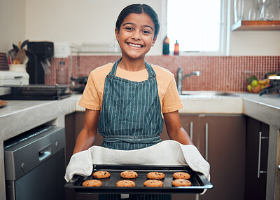 Buy stock photo Baking, cookies and girl portrait happy about food, learning and youth helping in the kitchen and home. Cooking, house and child baker with a proud smile and happiness from making a kid dessert