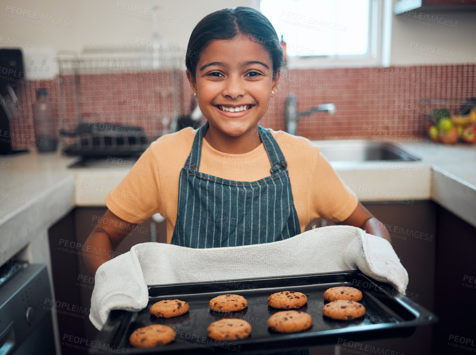 Buy stock photo Girl kid, cookies and baking with portrait and bakery skill, learning and development with success and pride. Cookie, dessert and proud child baker cooking in kitchen with achievement and happiness.