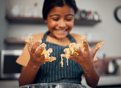 Buy stock photo Girl, hands and dough while learning cooking in home kitchen. Baking, education and happy child chef with bowl and flour mixture, smiling and having fun while preparing delicious pastry in house.