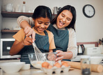 Mom, kid and baking in kitchen, family home and house for childhood fun, learning or development. Mother and daughter cooking, teaching and mixing ingredients in bowl to bake dessert, flour and whisk