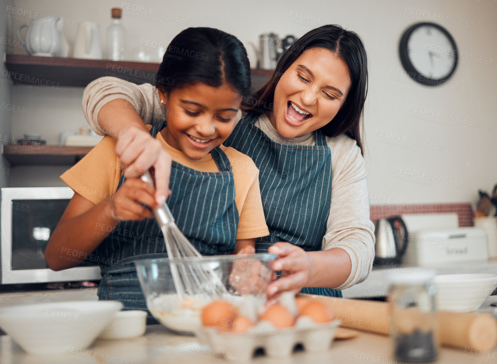 Buy stock photo Mom, kid and baking in kitchen, family home and house for childhood fun, learning or development. Mother and daughter cooking, teaching and mixing ingredients in bowl to bake dessert, flour and whisk