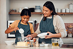 Mother, girl and learning cooking in kitchen, bonding or having fun. Love, care and happy mama teaching kid chef baking, mixing flour in bowl and smiling while enjoying quality time together in house