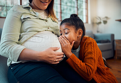 Buy stock photo Pregnant, children and stomach with a mother and daughter whispering to a sibling in a belly at home. Whisper, love and kids with a girl talking to her unborn sister in the tummy of a woman