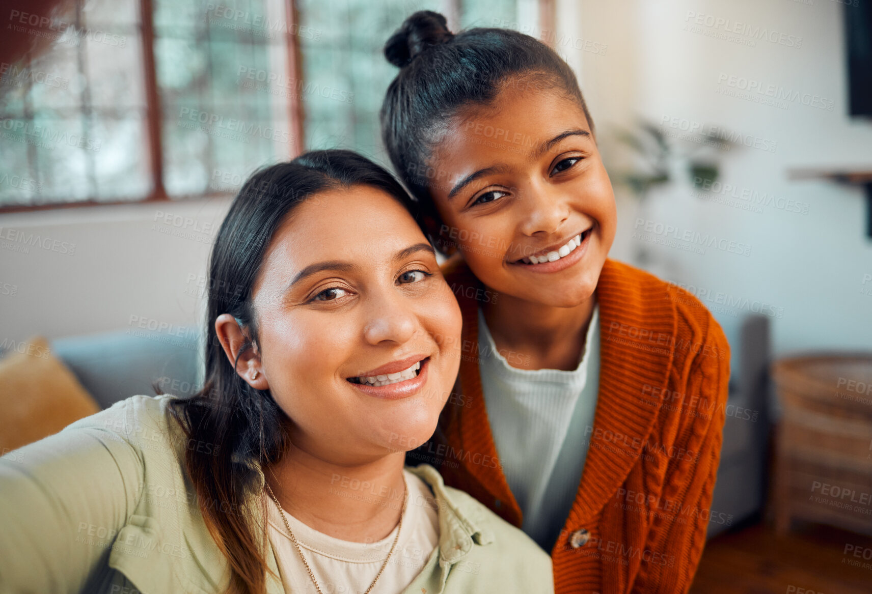 Buy stock photo Portrait, mother and girl take a selfie for social media content as a happy family at home during holiday vacation. Face, photography or Indian mom taking pictures with a fun child for social network