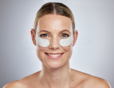 Buy stock photo Skincare, beauty and eye mask with woman portrait happy about skin glow and spa treatment. Wellness, facial and smile of a model face with happiness from cosmetic, collagen and dermatology face mask