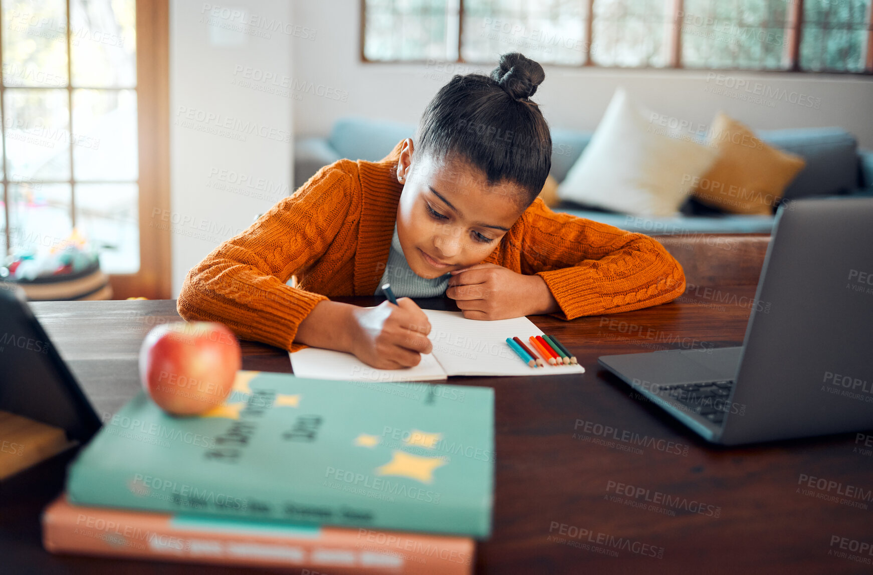 Buy stock photo Education, home school and distance learning with a student girl writing in her book during an online class. Laptop, study and kids with a female pupil or child learner in her house for development