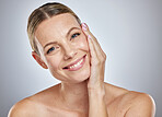 Skincare woman in studio portrait happy with natural makeup, cosmetics and clean facial for glow, shine and foundation marketing. Face of a young model with smile for dermatology results or benefits