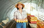 Asian farmer woman, portrait and egg production for organic small business, sustainability and smile. Happy chicken farming expert, success and vision with agriculture goals in countryside with eggs