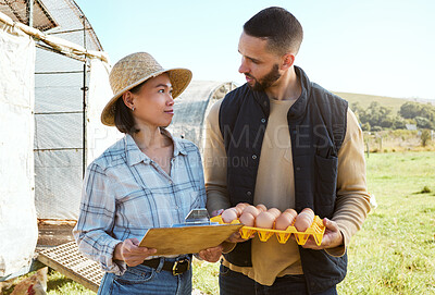 Buy stock photo Farmer, man and woman for egg inspection, agriculture or production at poultry farm in countryside. Farming team, chicken product or quality assurance process for health, wellness and protein of eggs