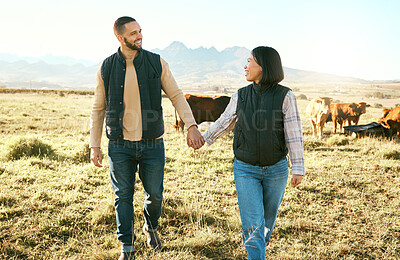 Buy stock photo Farmer couple, cattle farming and happy while holding hands and walking together on grass field of a sustainable farm with cow animals. Woman and man with support for rural countryside lifestyle