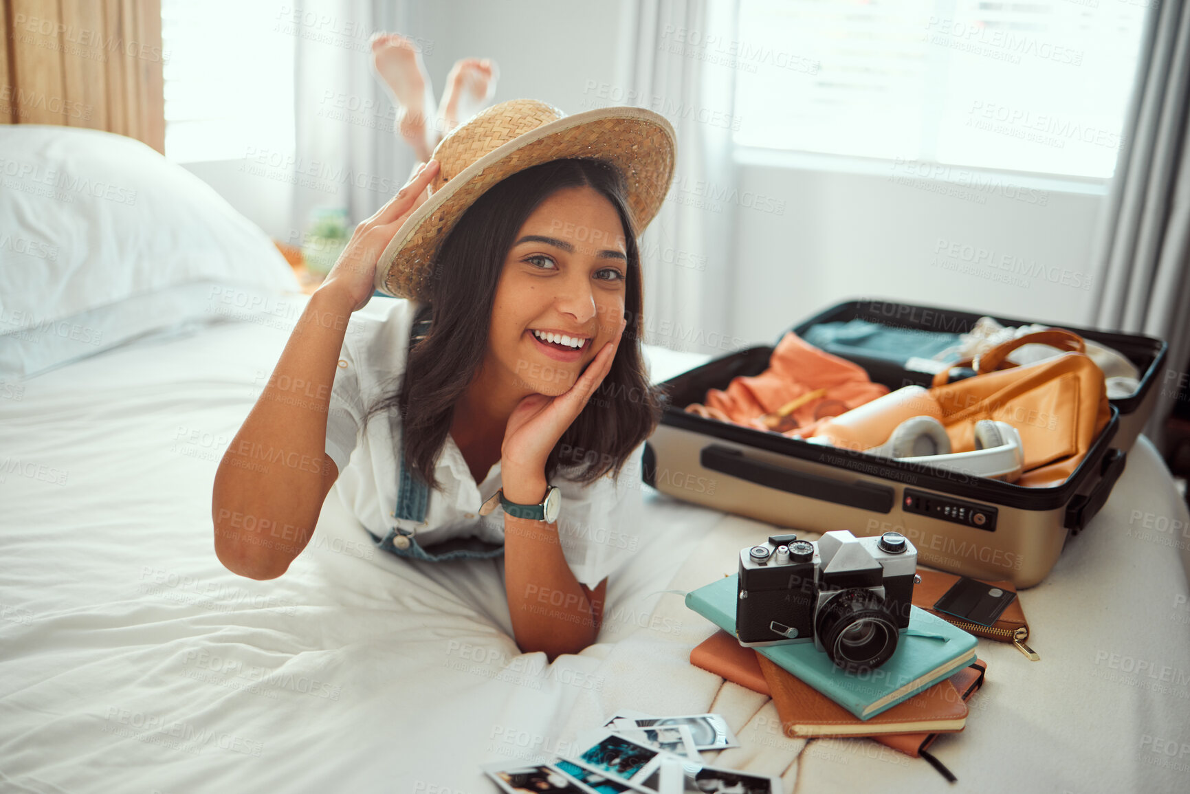 Buy stock photo Travel, luggage and woman on bed with clothes, camera and suitcase for adventure, holiday and vacation. Traveling lifestyle, freedom and portrait of girl in bedroom pack for journey, tourism and trip