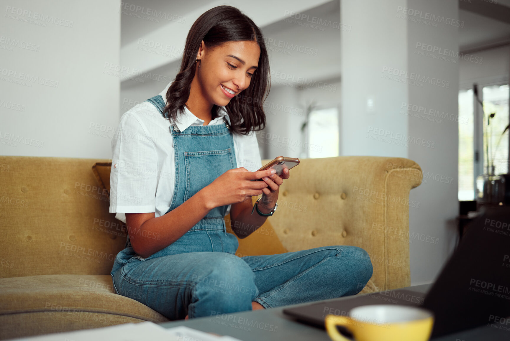 Buy stock photo Woman, phone and social media mobile reading of a person relax on a home living room sofa. Internet, web and social network texting of a young female on a house couch scroll through communication app