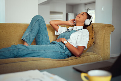 Buy stock photo Young woman, headphones and relax with music at home, peace and calm with podcast or radio, audio streaming online. Freelancer on break, work from home and wellness with sound and listening.