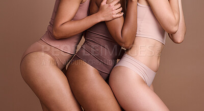 Buy stock photo Diversity, body positive and woman in underwear for skincare beauty, dermatology wellness and self care support in studio. Interracial lingerie model, body care and natural glow or female solidarity 