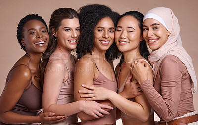 Buy stock photo Diversity, women and body positivity for skincare, wellness and solidarity on brown studio background. Multiracial, females, portrait or ladies with smile, confidence or cosmetics for health or relax