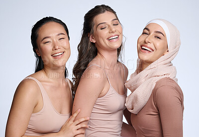 Buy stock photo Face, beauty skincare and group of women in studio isolated on gray background. Diversity, cosmetics and portrait of girls, friends or female models in makeup with healthy skin after facial treatment