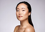 Skincare, asian and woman in studio portrait for beauty, natural makeup and cosmetics on mockup for wellness, glow and shine marketing. Seoul skin care, face model in headshot for foundation results