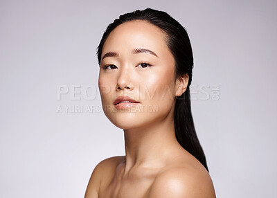 Buy stock photo Skincare, asian and woman in studio portrait for beauty, natural makeup and cosmetics on mockup for wellness, glow and shine marketing. Seoul skin care, face model in headshot for foundation results