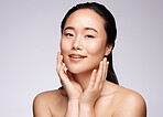 Face portrait, skincare and beauty of Asian woman in studio isolated on a gray background. Makeup, natural cosmetics and female model with healthy, glowing or flawless skin after spa facial treatment