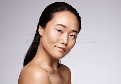 Buy stock photo Beauty, skincare and portrait of Asian woman in a studio with a health, wellness and hygiene face routine. Cosmetic, healthy and model with clean, spa and natural facial treatment by gray background.