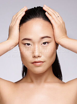 Buy stock photo Portrait, Asian woman and cosmetics for skincare, wellness and health on grey studio background. Makeup, female and lady with natural beauty, face detox and organic facial for clear and smooth skin.
