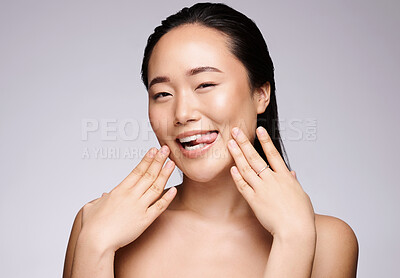 Buy stock photo Woman, skincare portrait and beauty in studio, funny face and tongue smile for cosmetic glow by wall. Asian model, happy and makeup with cosmetics facial, wellness and comic for health in by backdrop