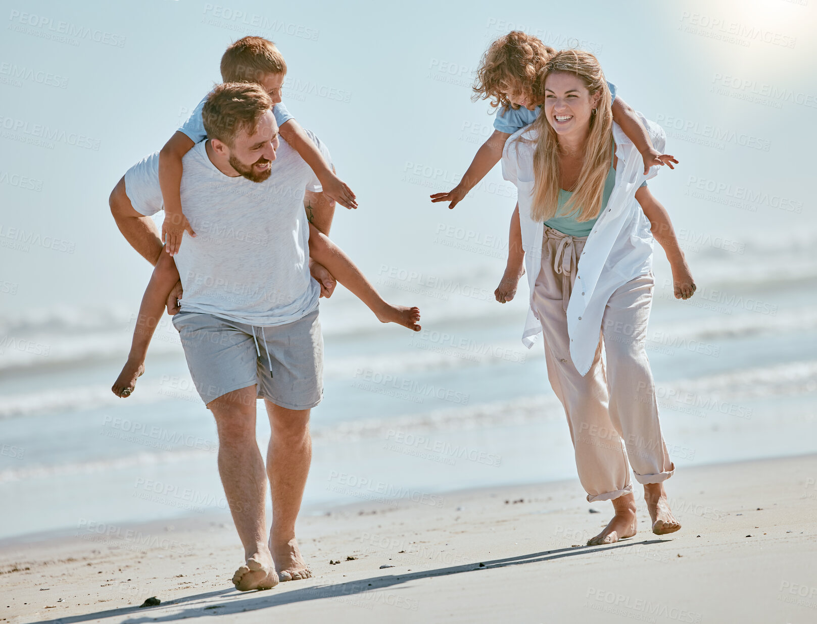 Buy stock photo Freedom, travel and piggyback with family on beach for summer break, happiness and bonding on vacation. Tropical, destination and support with parents playing with children on trip for Cancun holiday