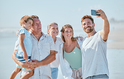 Buy stock photo Selfie, family and beach with children, parents and grandparents posing for a photograph by the sea or ocean. Love, kids and holiday with a man, woman and son taking a picture during summer vacation