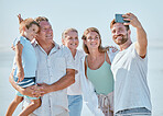 Love, beach and phone selfie of happy family in outdoor nature for peace, freedom and bonding quality time. Picture memory, summer holiday and big family of parents, grandparents and child in Canada