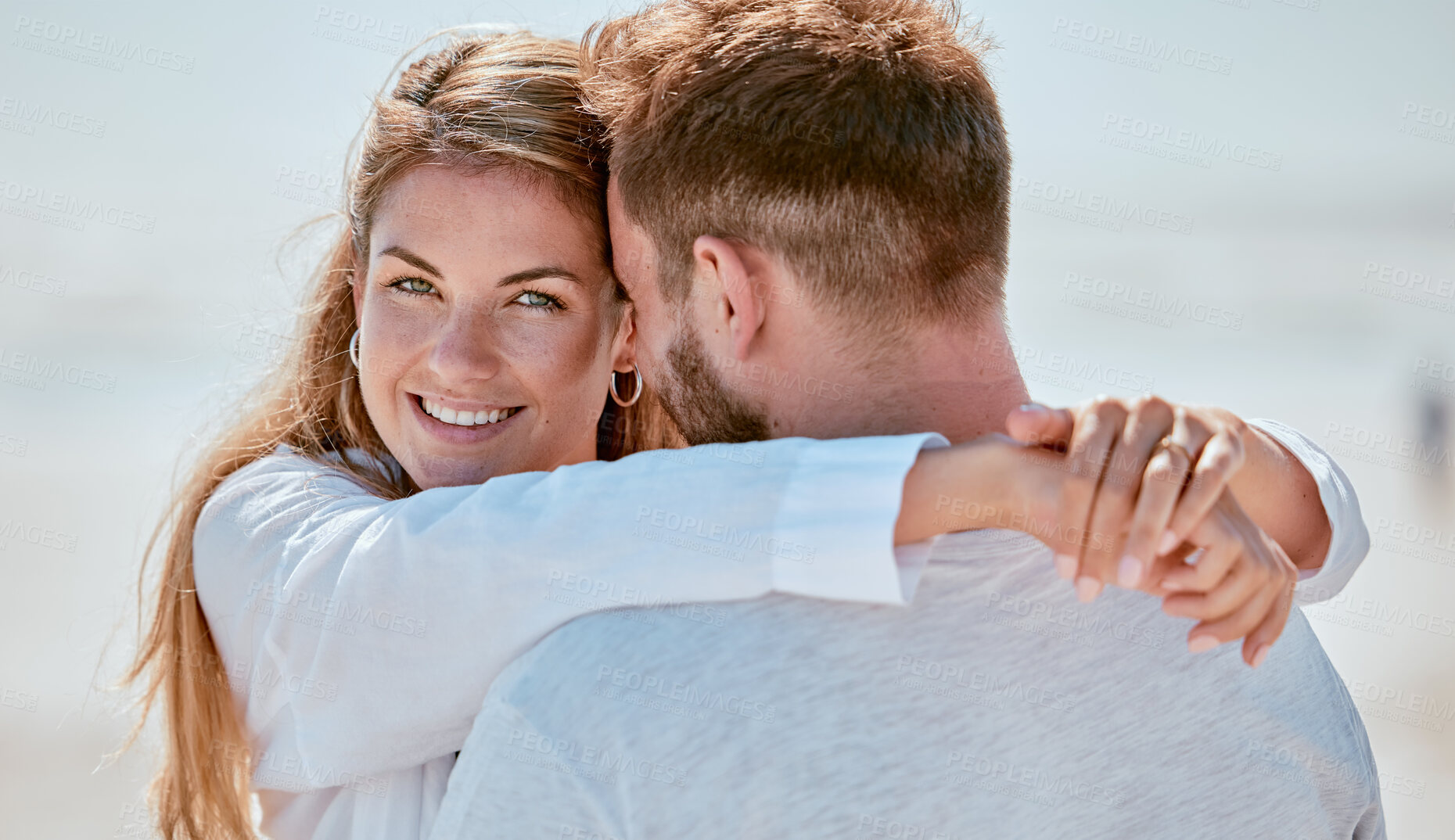 Buy stock photo Love, couple and hug at beach portrait with smile for bond, trust and gratitude on holiday in Canada. Romance, care and joy of young people in happy relationship enjoying summer sunshine together.