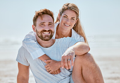 Buy stock photo Love, couple and hug at beach on vacation, holiday or summer trip. Portrait, romance or care of man and woman hugging, cuddle or embrace and relaxing, having fun or enjoying time on seashore outdoors