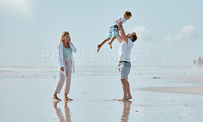 Buy stock photo Family, beach and father lifting kid on vacation, holiday or summer trip outdoors. Love, support and care of mother, man and boy playing, bonding and having fun while enjoying quality time together