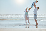 Family, beach and summer vacation with mother, father and child together for fun, love and care while together in water while playing. Man, woman and kid playing airplane game on sea holiday