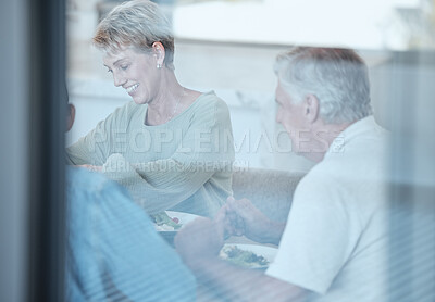 Buy stock photo Love, celebration and family with dinner through window enjoy festive meal, lunch and eating food together. Christmas, thanksgiving and grandparents bonding, happy and laugh at dinner party at home