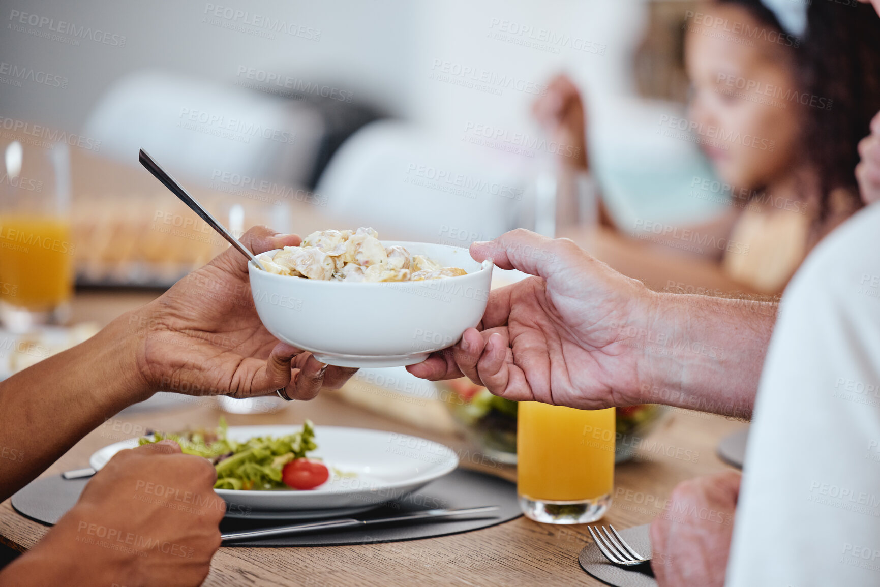 Buy stock photo Food, lunch and hands pass bowl with delicious pasta at home. Brunch, fine dining and family or people eating and sharing a tasty, gourmet and healthy meal on table together in house dinning room