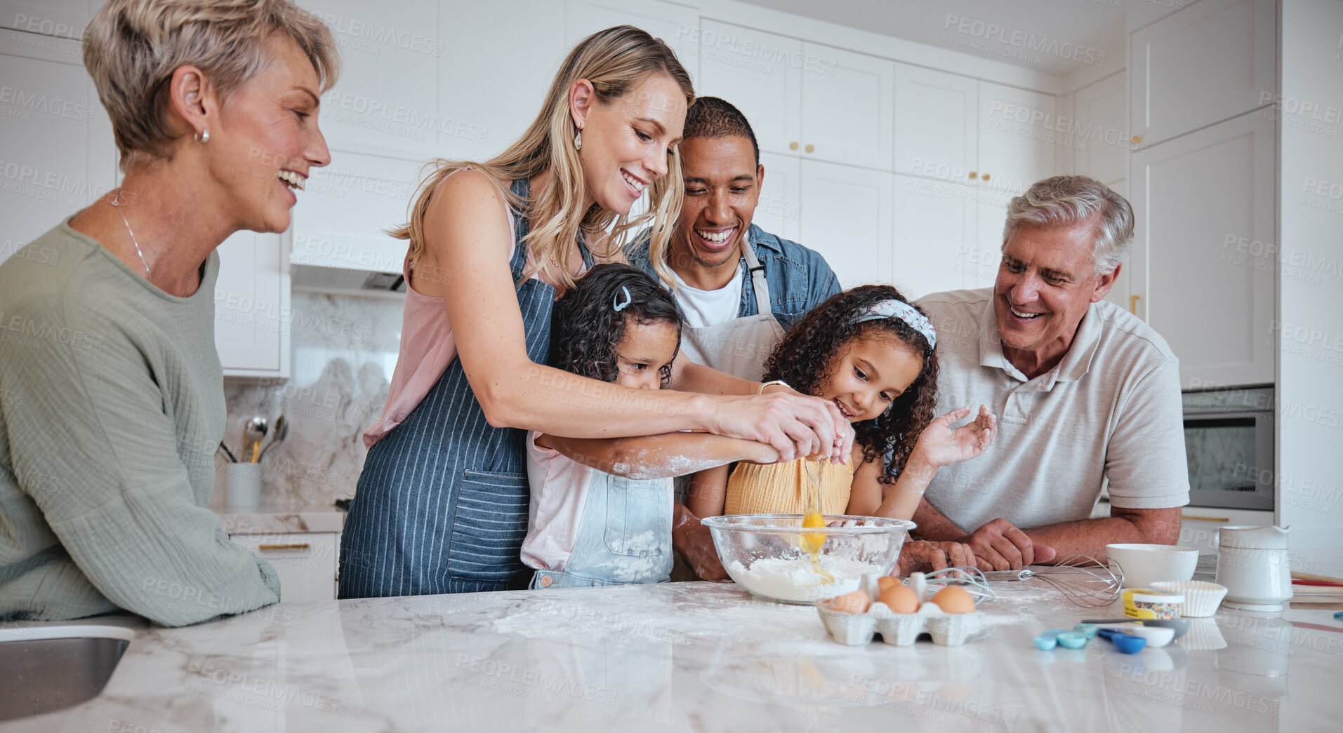 Buy stock photo Happy family, children or bonding in fun baking in house or home kitchen and interracial father, mother or senior grandparents. Smile, happy or cooking kids with women, eggs or retirement elderly men