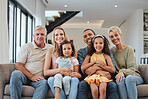 Big family, smile and portrait of children, parents and grandparents together for love, care and support while on a living room couch in UK home. Smile of men, women and kids on sofa for bonding