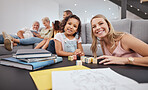 Happy, living room and mother playing with her child while bonding with the family in a modern home. Happiness, smile and portrait of a woman being playful with wood blocks with girl kid at a house.