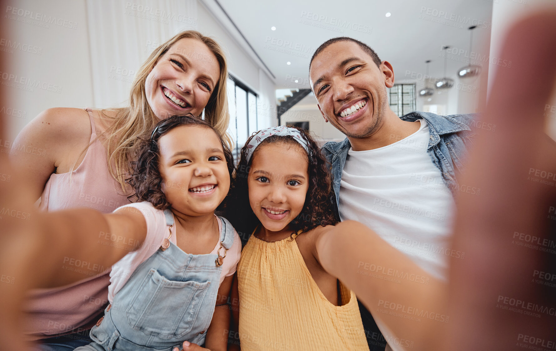 Buy stock photo Family selfie, bonding and children with parents, cheerful and playful smile on the living room sofa. Quality time, happy photo and girl kids with interracial mother and father for a home memory