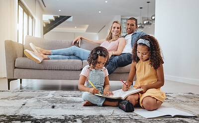 Buy stock photo Learning, family and kids drawing in living room with parents on sofa. Art, education and creative girls sitting on floor while sketching in coloring book, studying and bonding together in house.