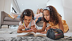 Girl children, creative and color in book while parents relax, together in family home and spending quality time. Family, mother and father watch kids, love and care with art activity or homework.