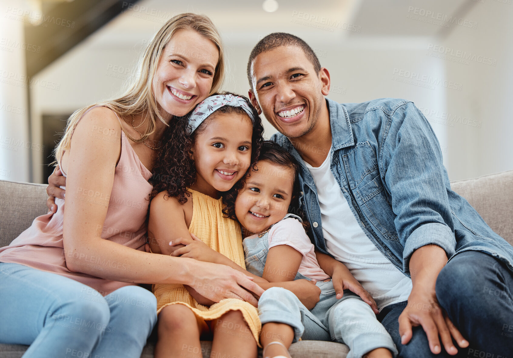 Buy stock photo Love, diversity and portrait of happy family hug in rent house living room, bonding and enjoy quality time together. Happiness, child support care and children with mother, father or parents on sofa