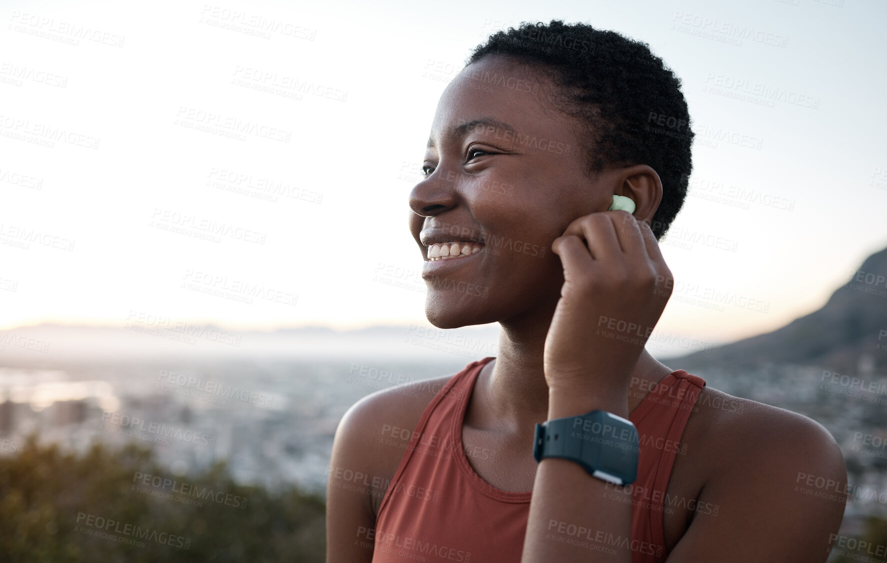 Buy stock photo Earphones, music and fitness with a sports black woman in nature for exercise or a cardio workout. Training, thinking and running with a female athlete streaming audio while endurance exercising