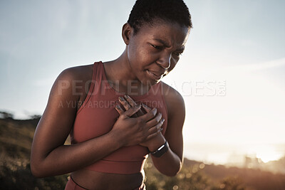 Buy stock photo Black woman, runner and heart attack pain in nature while running outdoors. Sports, cardiovascular emergency and female athlete with chest pain, stroke or cardiac arrest after intense cardio workout.