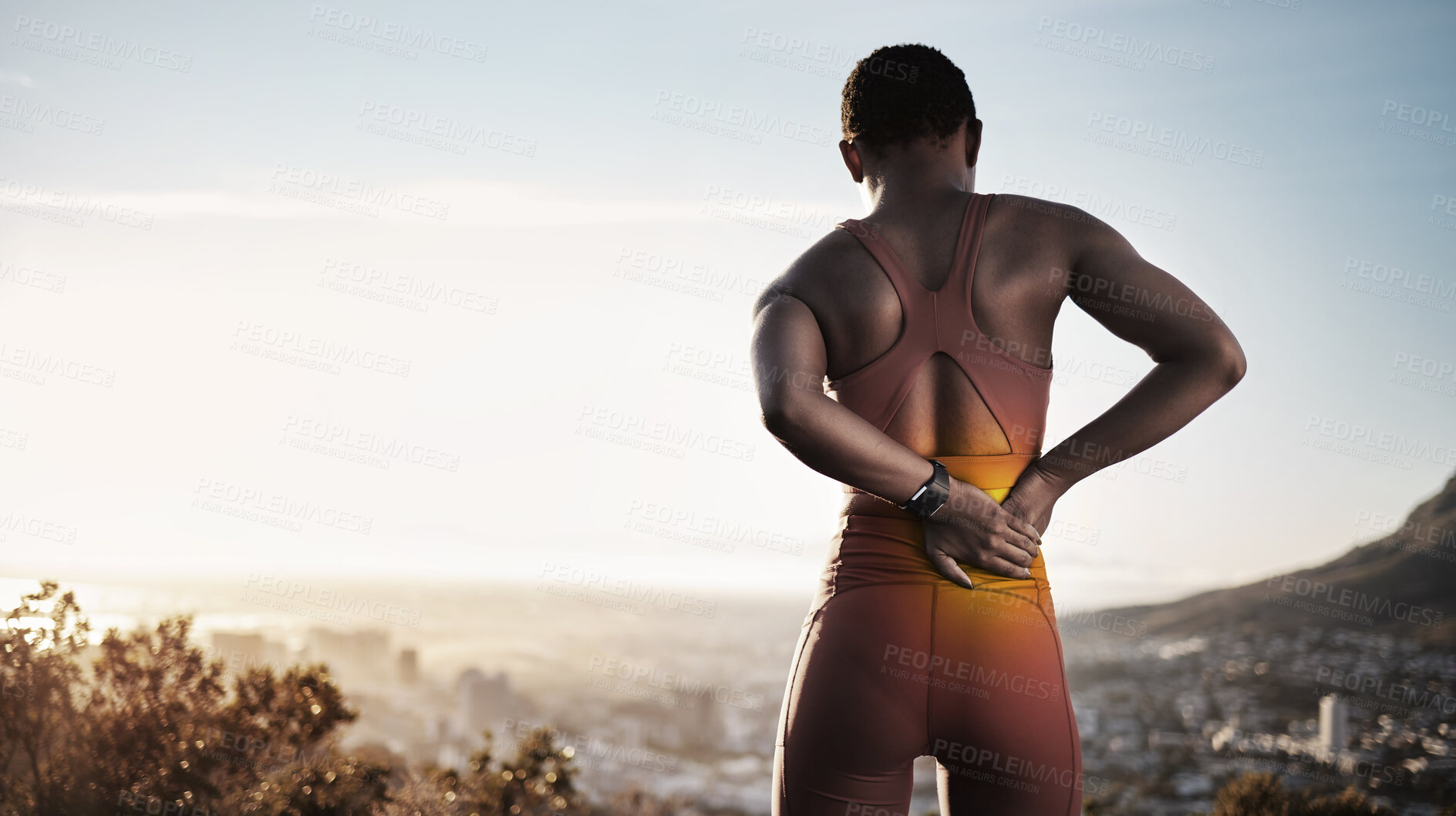Buy stock photo Black woman runner, back pain and exercise in morning, summer and city with skyline, smartwatch and rest. Urban workout, muscle injury or self care for physical therapy in nature, outdoor and running