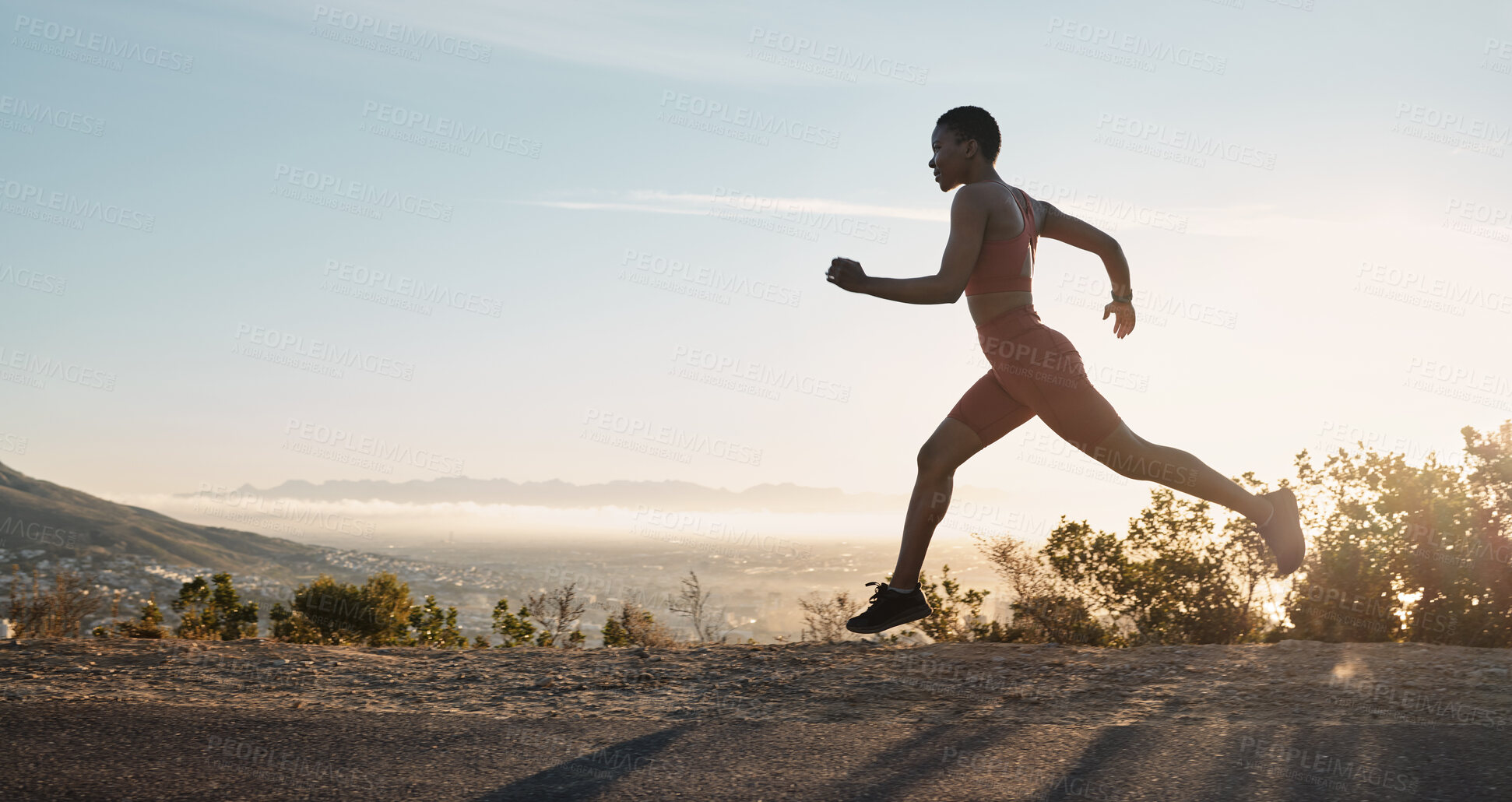 Buy stock photo Black woman, fitness and running on mountain during sunset for workout, training or exercise in the nature outdoors. African American woman runner in sport exercising for healthy cardio on mockup