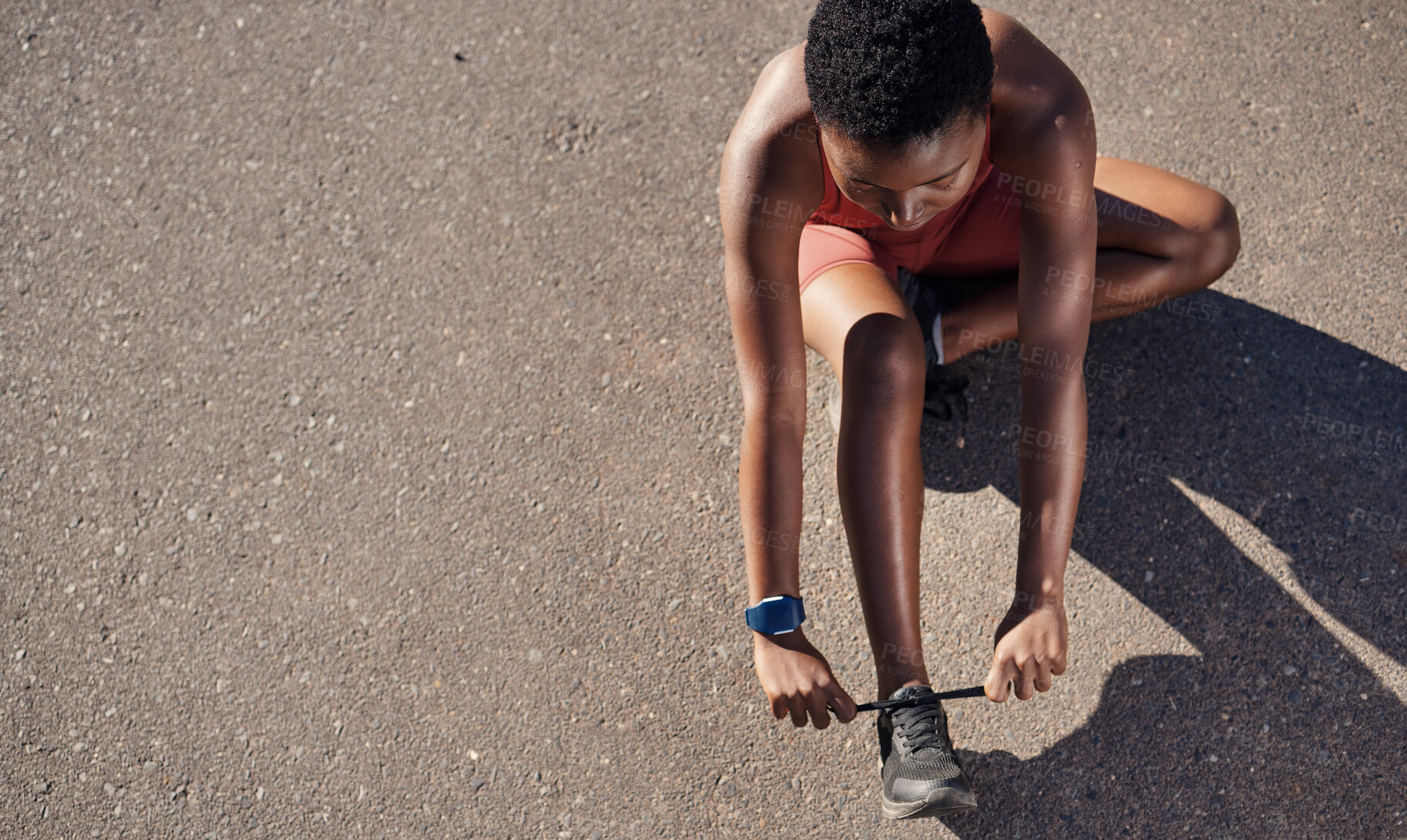 Buy stock photo Black woman, fitness and shoes in preparation for running, exercise or cardio workout on mockup. African American woman runner tying shoe lace getting ready for race, run or sports above on mock up