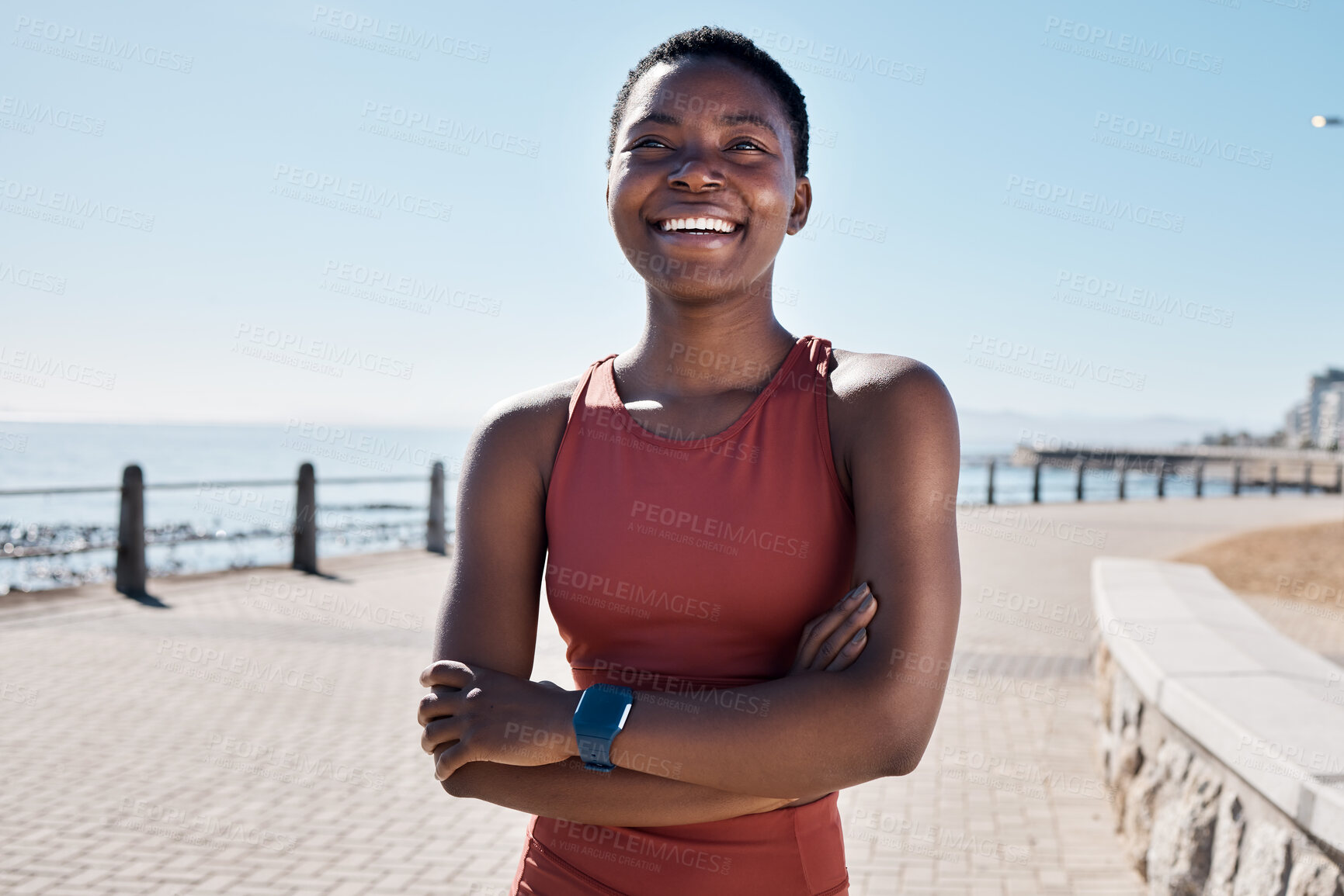 Buy stock photo Fitness, happy black woman and thinking on beach sidewalk of vision, mindset and motivation for summer body goals, healthy exercise and wellness. Female sports athlete, smile and arms crossed at sea